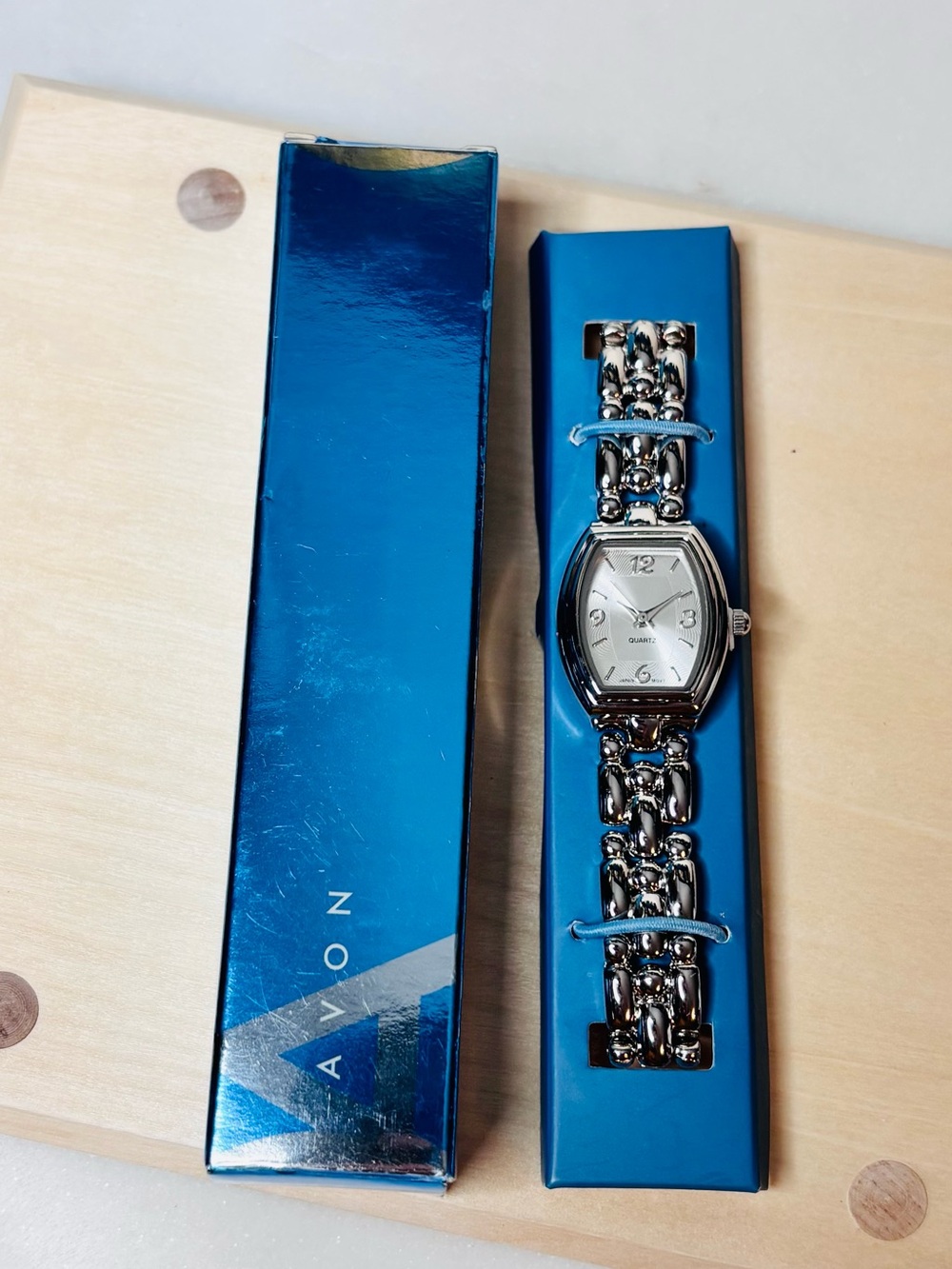 Avon Women’s Silver Chain-Link Bracelet Watch